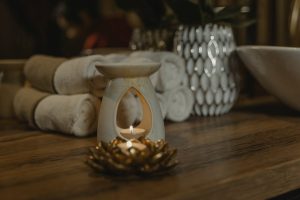 cozy bathroom spa atmosphere candles towels relaxation landscape