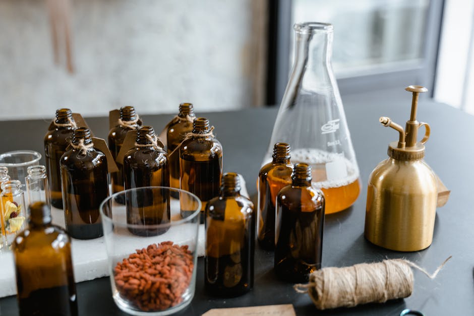 Peaux sèches en hiver : huile, beurre ou baume corporel, quelle texture choisir ? natural plant oils glass bottles avocado argan seeds ingredients