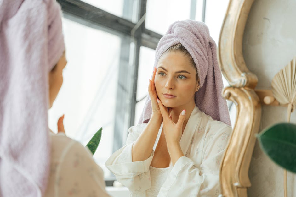 woman waking up morning touching face looking in mirror