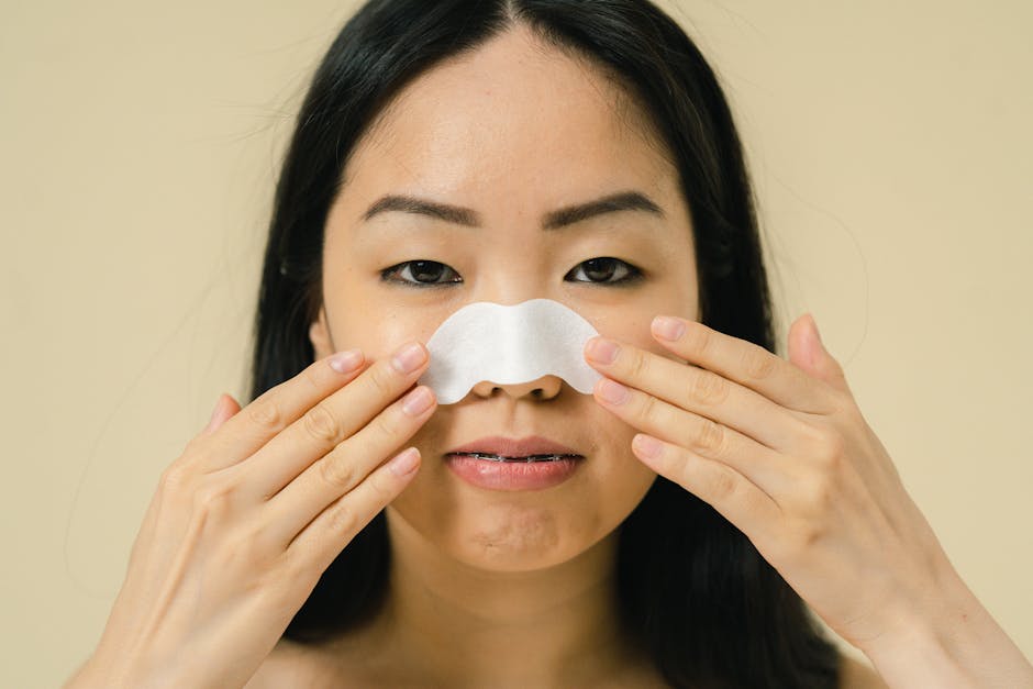 Ailes du nez : 5 rituels purifiants pour des pores nets et une peau matte close up woman nose pores skin care natural light