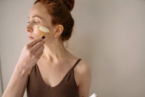 woman facial massage skincare routine glowing skin landscape