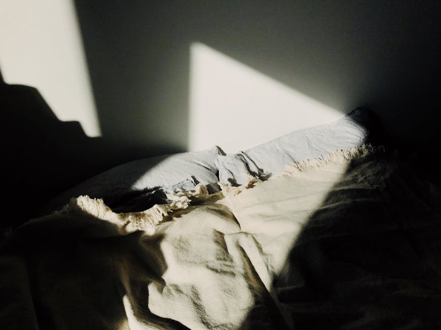 morning sunlight streaming through curtains bedroom peaceful