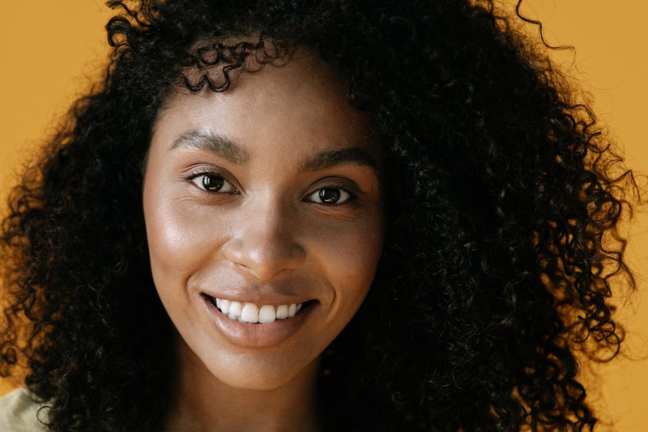 5 bonnes raisons de se mettre à la course à pied cette saison close-up of glowing healthy skin after exercise woman smiling