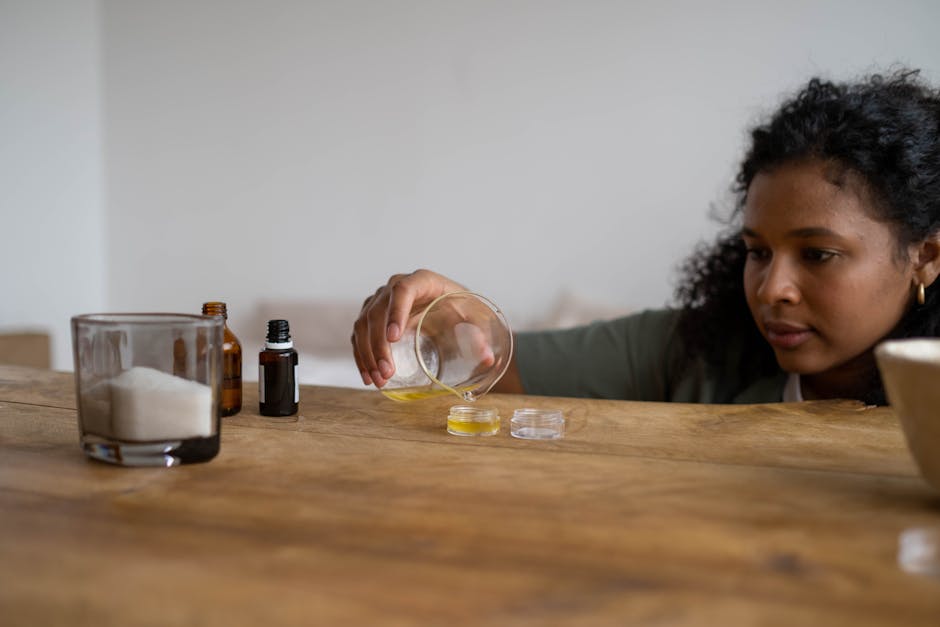 8 soins cocooning maison pour des mains douces et nourries woman applying homemade hand scrub natural ingredients wooden table