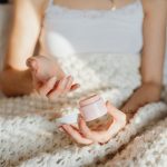 woman winter skincare hydration cozy morning routine landscape