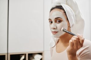 woman anti-aging face mask skincare beauty routine landscape