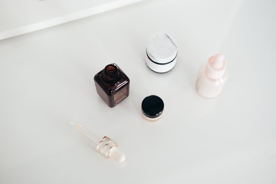 various lightweight skincare products serums lotions flat lay summer