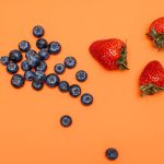 ellagic acid skincare red berries antioxidant beauty flat lay landscape