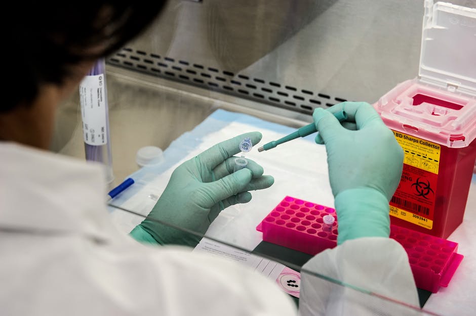 microbiologist sterile lab analyzing cosmetic sample