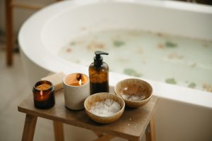 cozy scandinavian bathroom skincare ritual candles warm atmosphere landscape