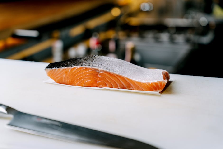 Les 5 vitamines anti-âge essentielles pour une peau jeune et lumineuse salmon fillet vegetable oils nuts kitchen table