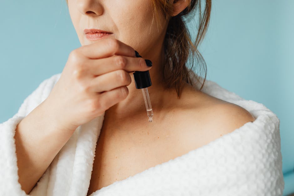 woman applying serum antioxidant skincare morning routine