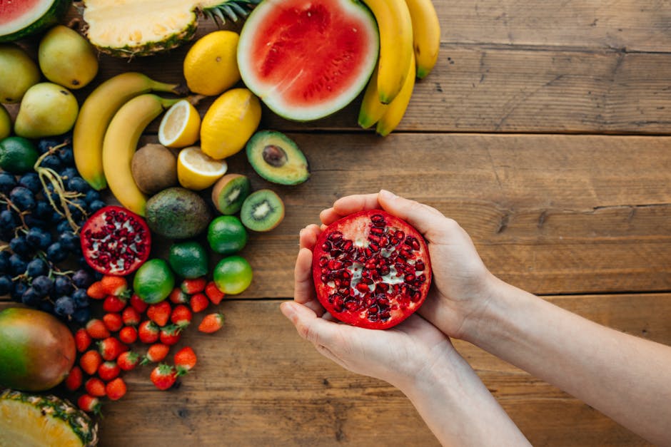 colorful antioxidant rich fruits vegetables flat lay pomegranate berries avocado