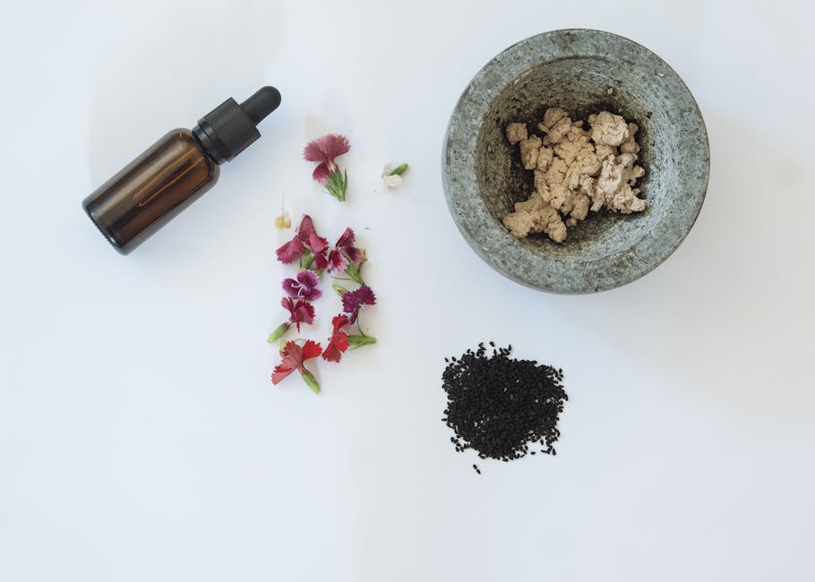 natural skincare ingredients oils vitamins green plants landscape