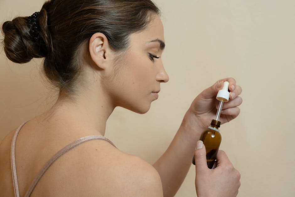woman beauty skincare routine body glow illuminating oil summer landscape