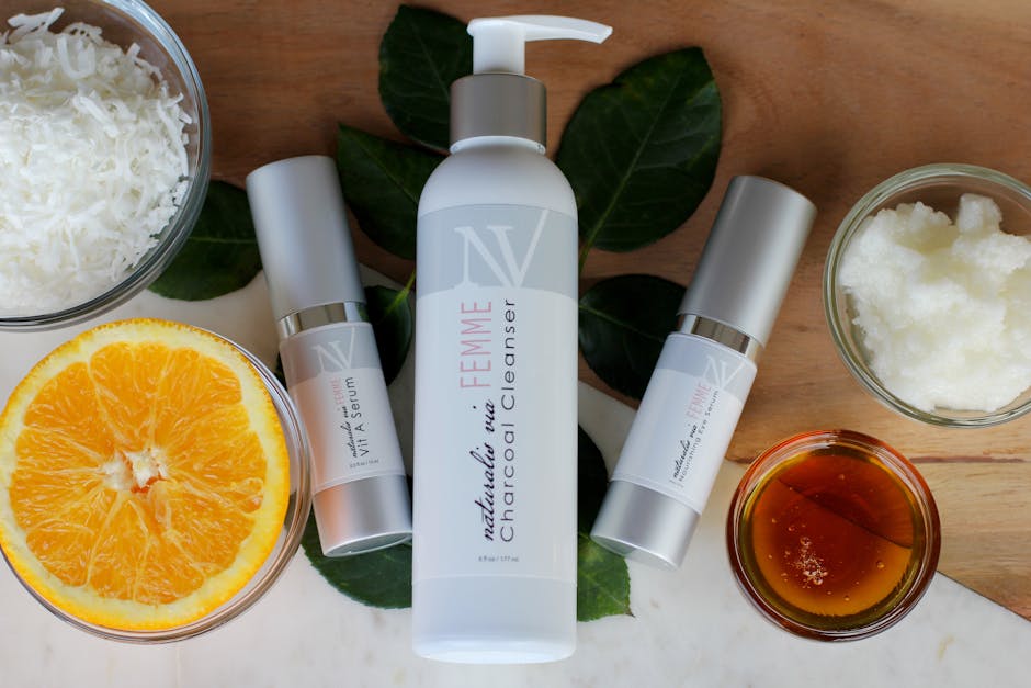 Flavonoïdes : bienfaits pour la peau, sources alimentaires et conseils pratiques skincare products with plant extracts serums and natural ingredients flat lay