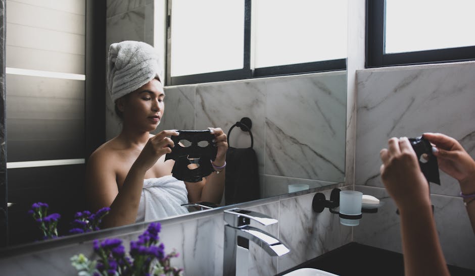 woman skincare routine cleansing face natural light bathroom landscape