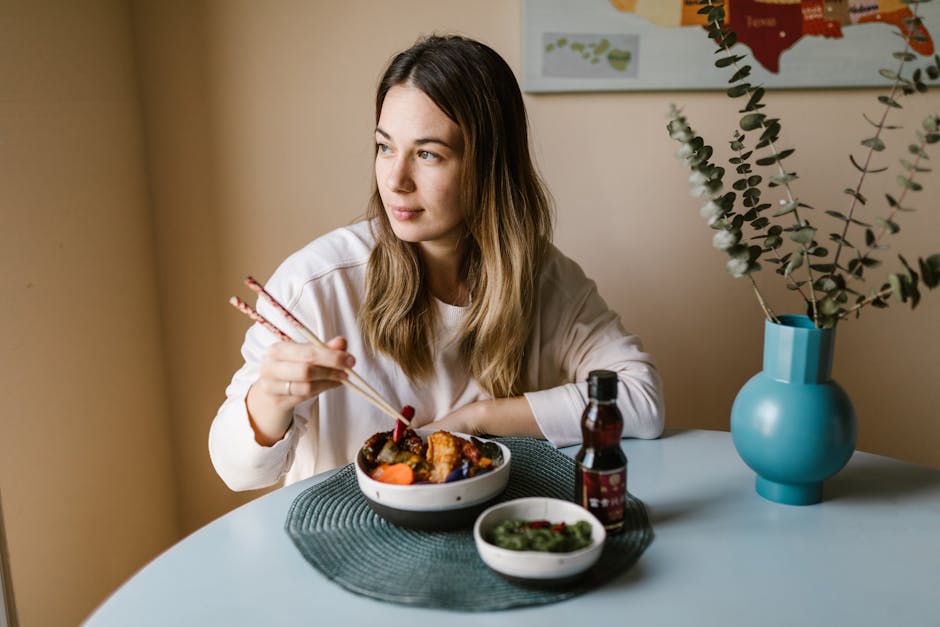 woman eating mindfully at table relaxed calm home setting