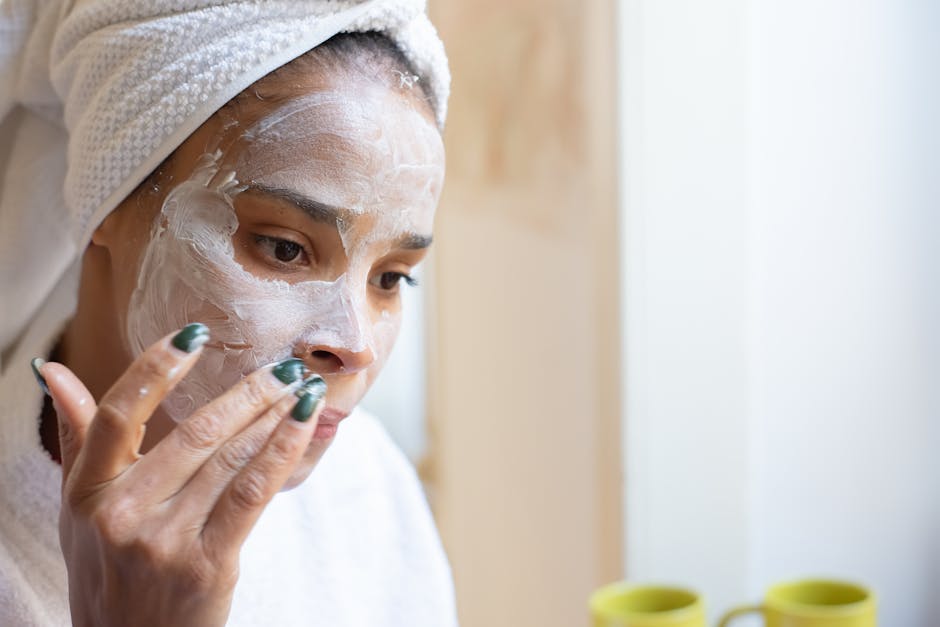 face mask application clay cream texture woman skin