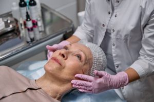 elegant woman mature skin beauty clinic consultation anti-aging treatment landscape