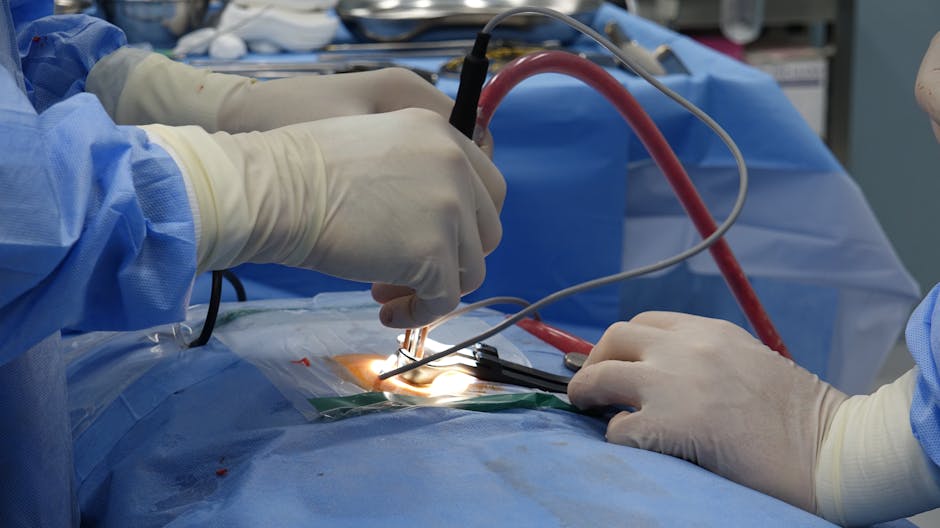 surgeon performing minimally invasive aesthetic procedure