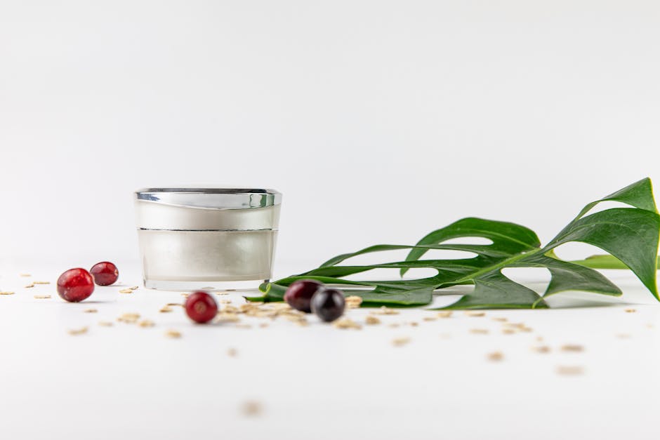 close-up cosmetic cream jar ingredient label white background