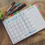 organized skincare routine products flatlay calendar beauty schedule