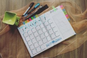 organized skincare routine products flatlay calendar beauty schedule