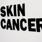 UV tanning bed danger skin cancer warning dermatology