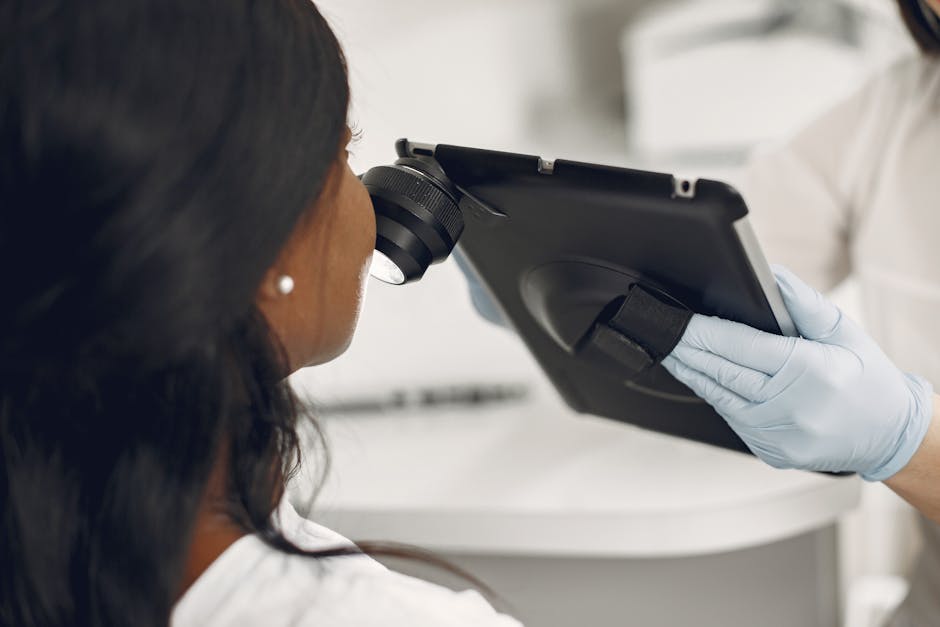 dermatologist examining skin mole medical consultation