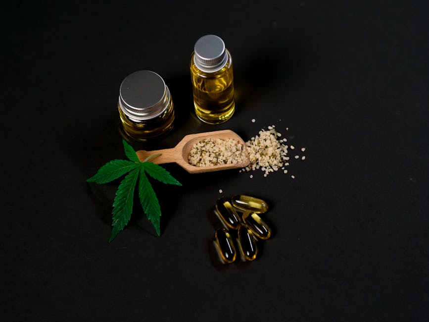 jojoba plant seeds golden oil bottle natural light