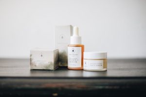 gentle hypoallergenic skincare products on soft neutral background landscape