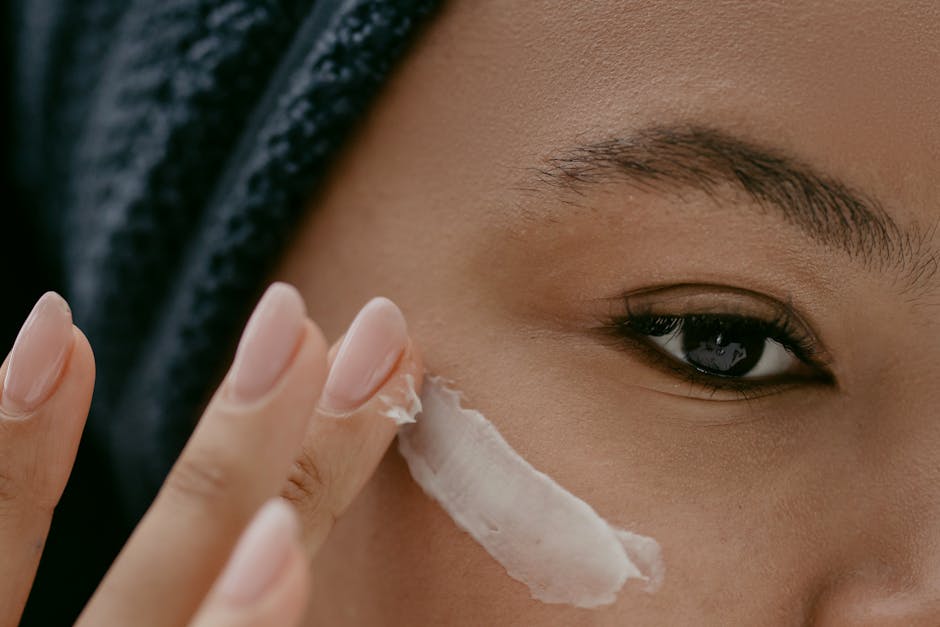 woman skincare eye contour routine soft light close up landscape