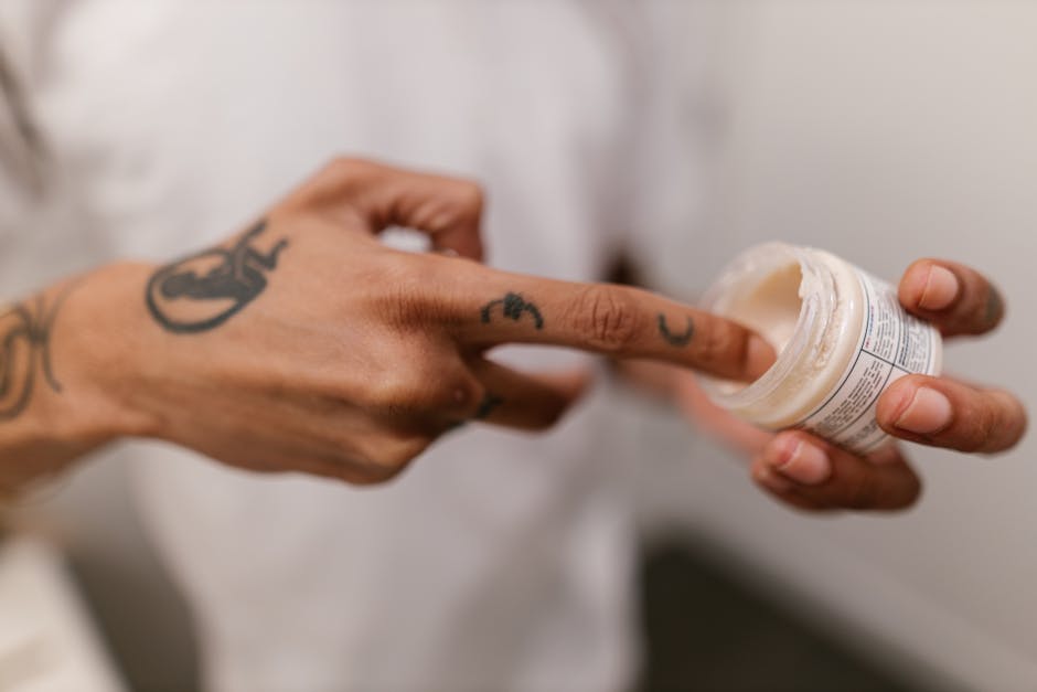 gentle skincare routine hands applying soothing cream