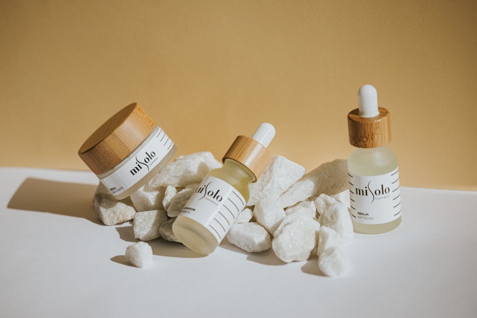 5 erreurs qui abîment votre peau (et comment les corriger dès ce soir) moisturizer cream jar with dropper serum on marble surface