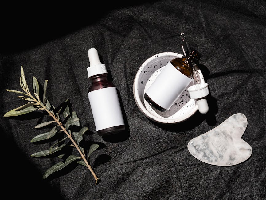 5 erreurs qui abîment votre peau (et comment les corriger dès ce soir) anti-aging serum bottle with botanical ingredients flat lay