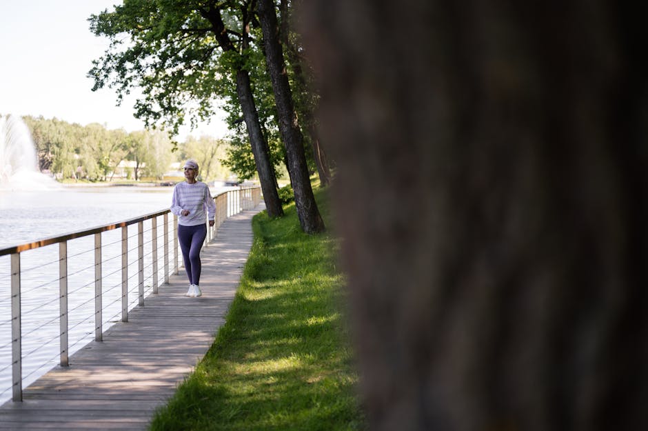 woman walking outdoors park sunny morning