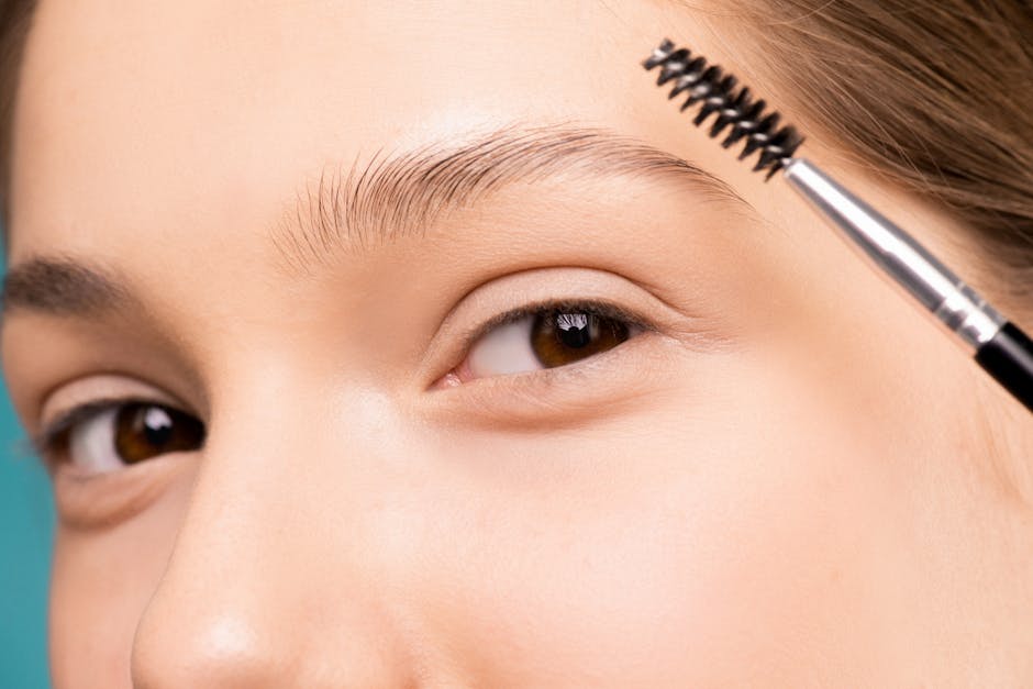 close-up eyebrow grooming mature woman natural light